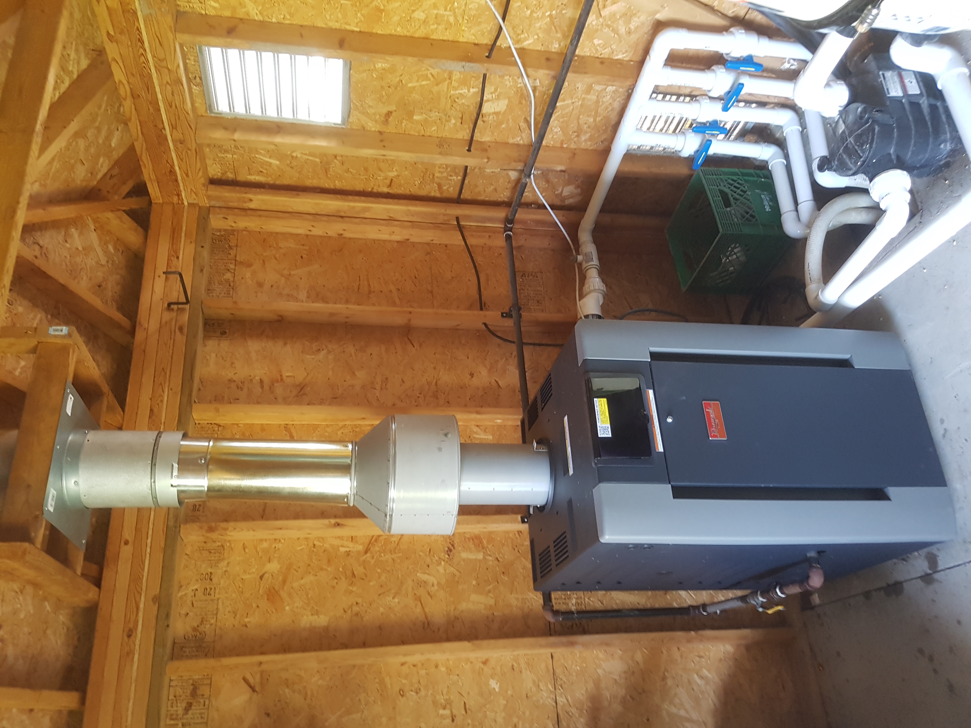 Pool heater installation in pump house